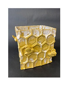 Image of Cinay Montanez's ceramic vessel, Bee Hive Box.